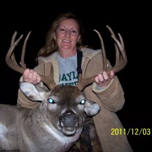 Dori Blesh, RRR Ranch with her big 11 point buck taken with her RRR Gun Rest. 'I was so steady I could not believe it. So, making a neck shot at 125 yards was easy. Thank you RRR Gun Rest'